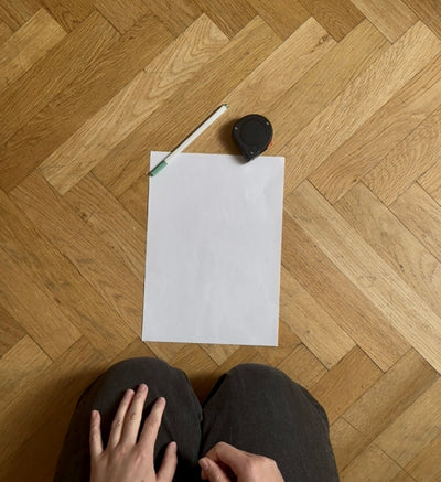 Place le papier au sol