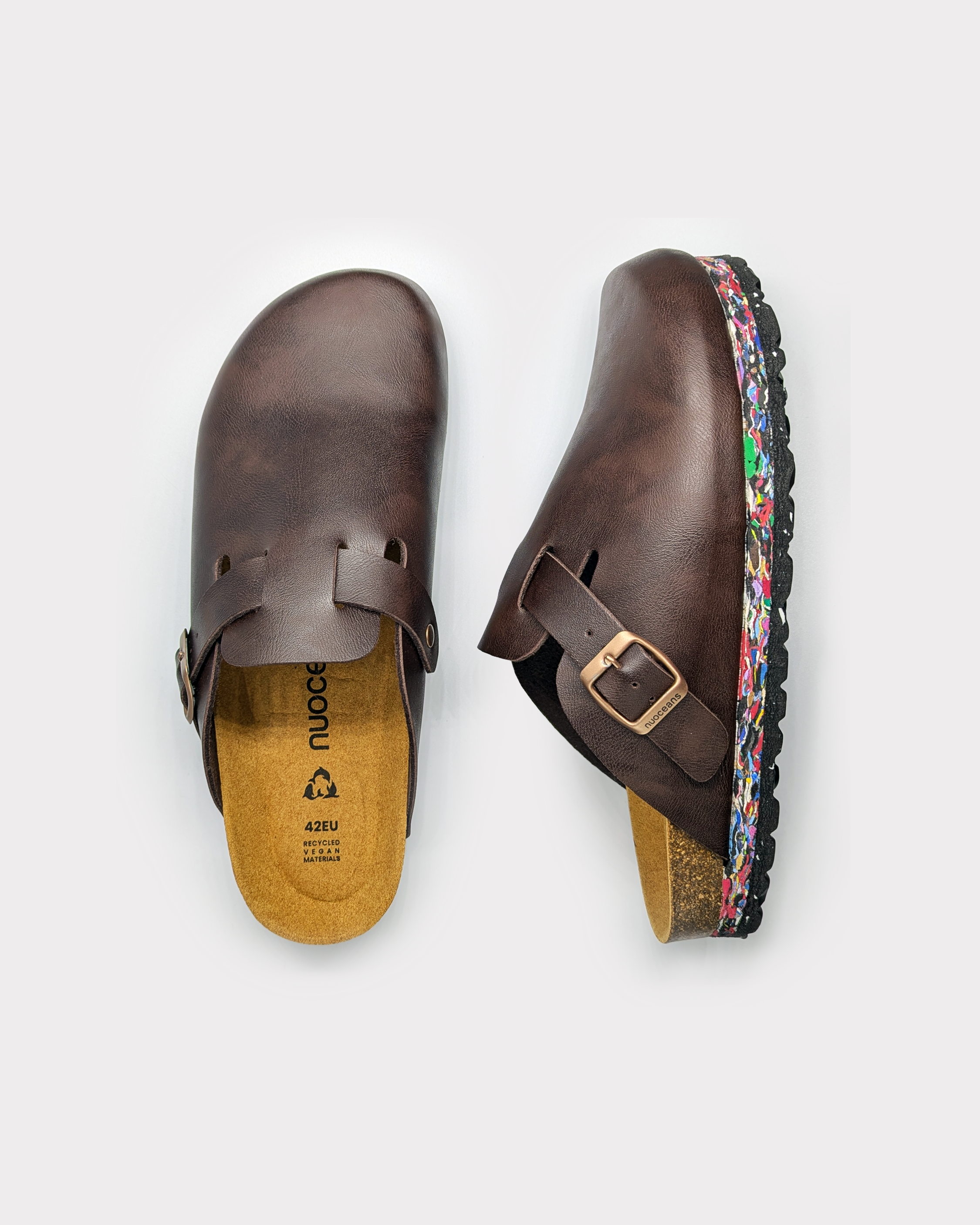 Pair of truffle brown clogs with ocean waste sole on a white background